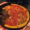 Chicago at leisure:  deep dish pizza at Ginos East, \